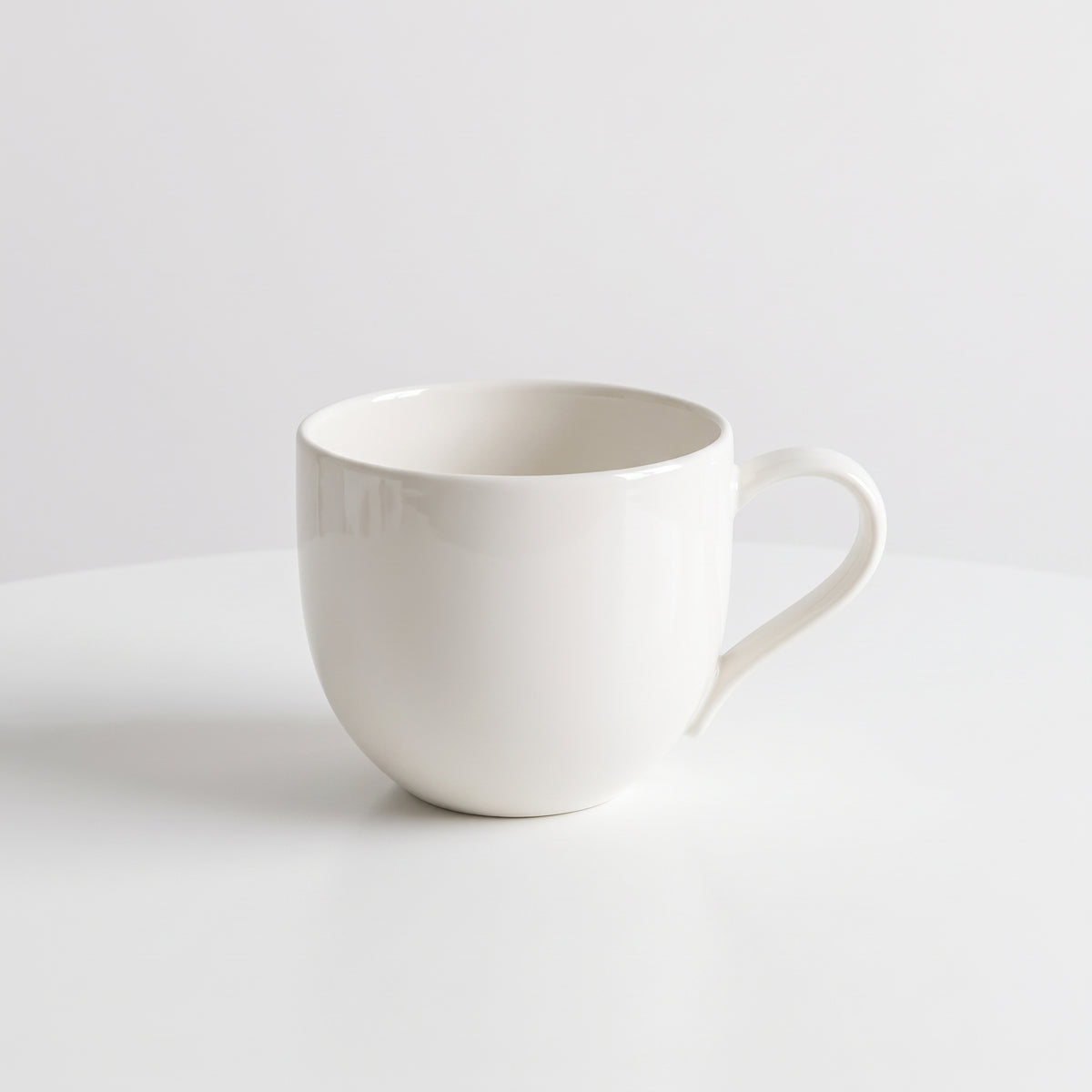 Minimalist white porcelain cup – Elegant mug for coffee and tea