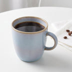 Light blue ceramic coffee mug – Elegant design with a glossy finish